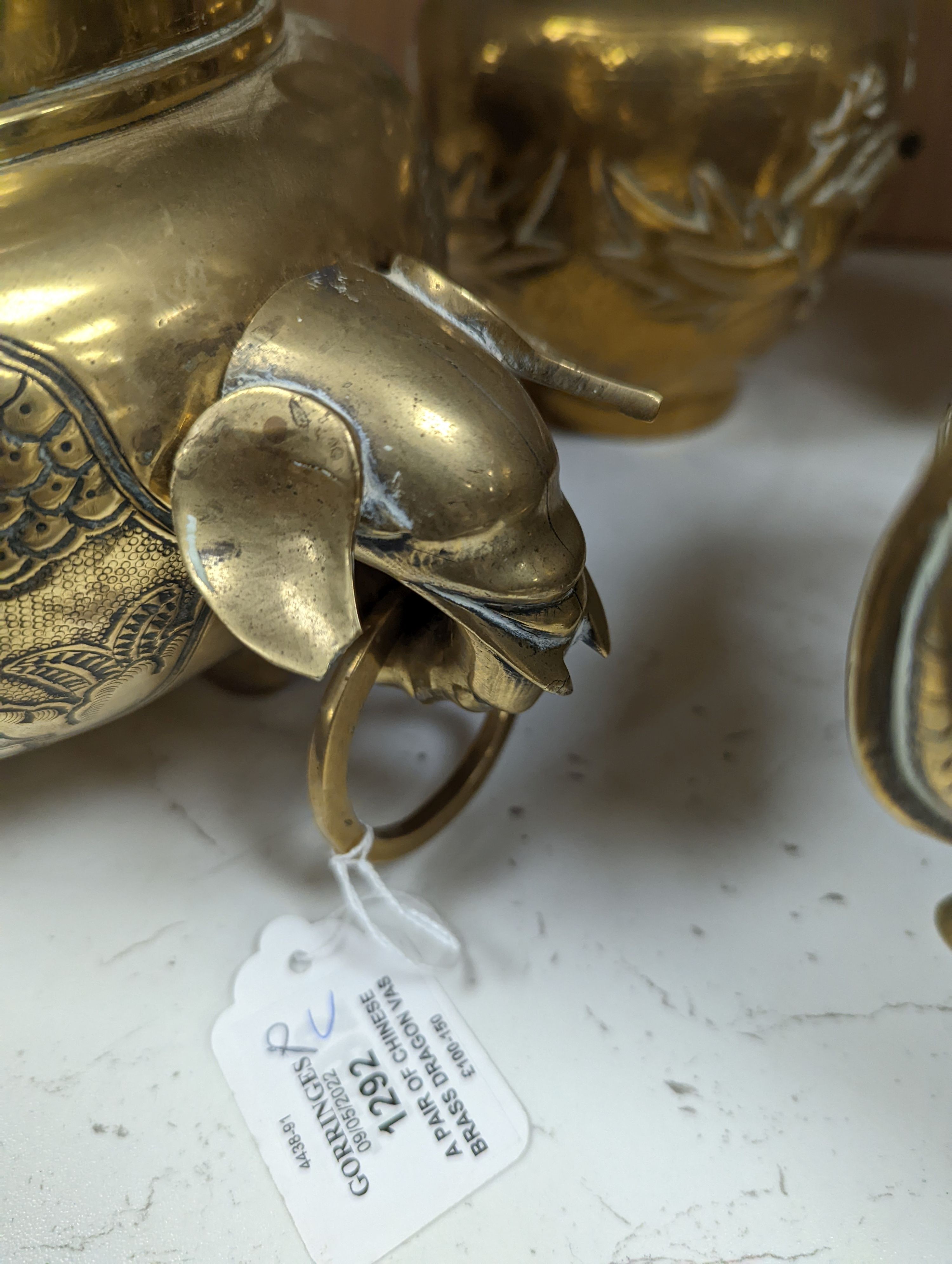 A pair of Chinese brass dragon vases, 26cm, together with two similar incense burners, tallest 30cm high